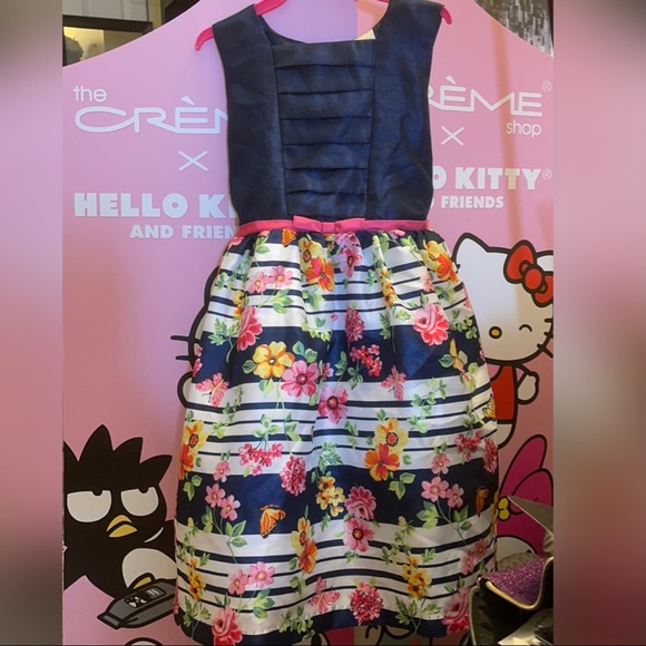 Blue dress with flower pattern on the skirt. - Picture 1 of 8